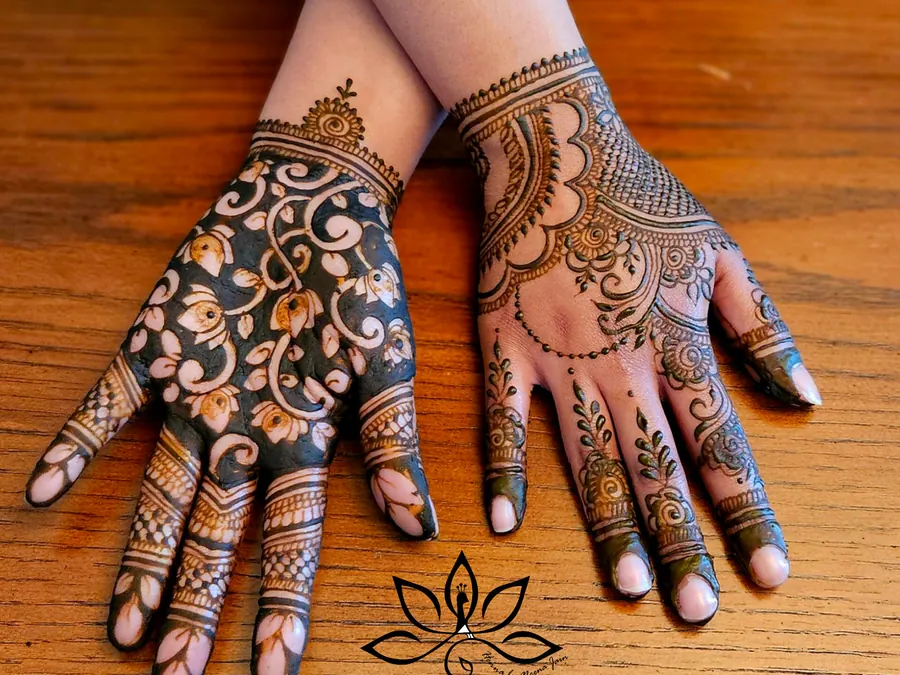 Stylish henna designs on two hands
